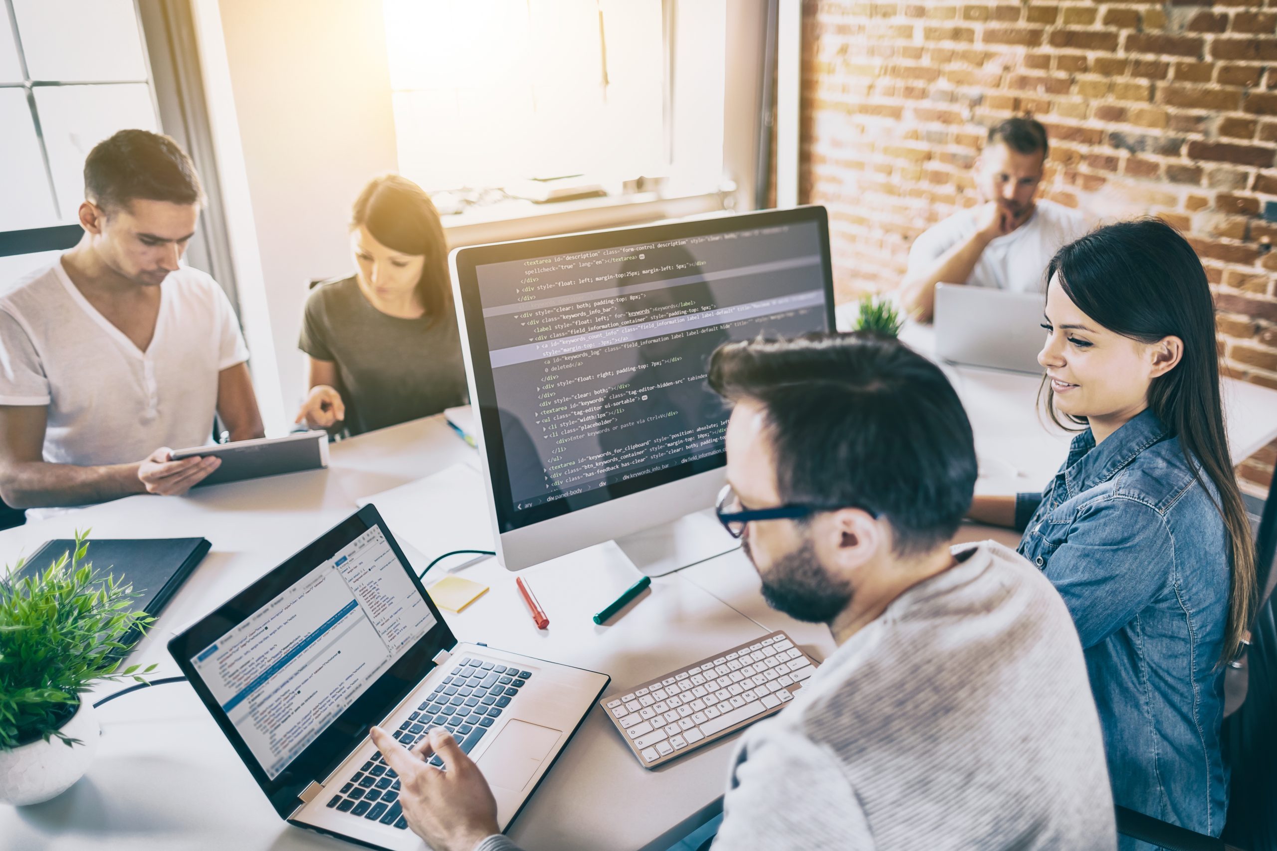 a team of developers working in an office